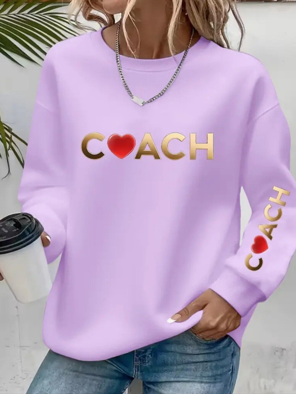 Lavendar Sweatshirt with Gold Logo and Red Heart On Sleeve